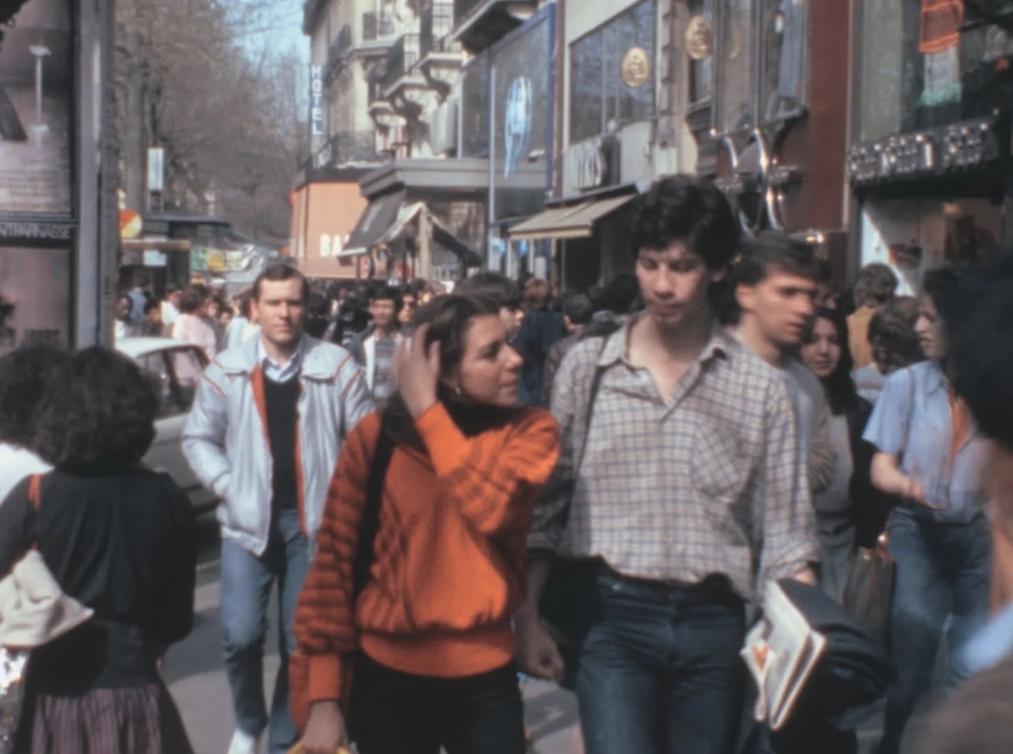 People walk in the Champs Elysées in Paris in the 1980s